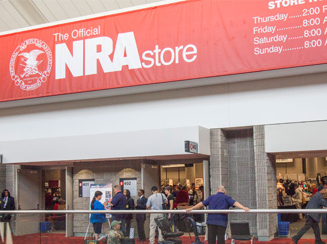 NRA store front with red banner.